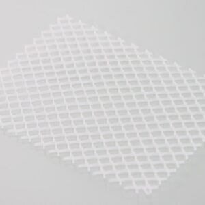 Grille intercalaire pour le nettoyage industriel des pièces
